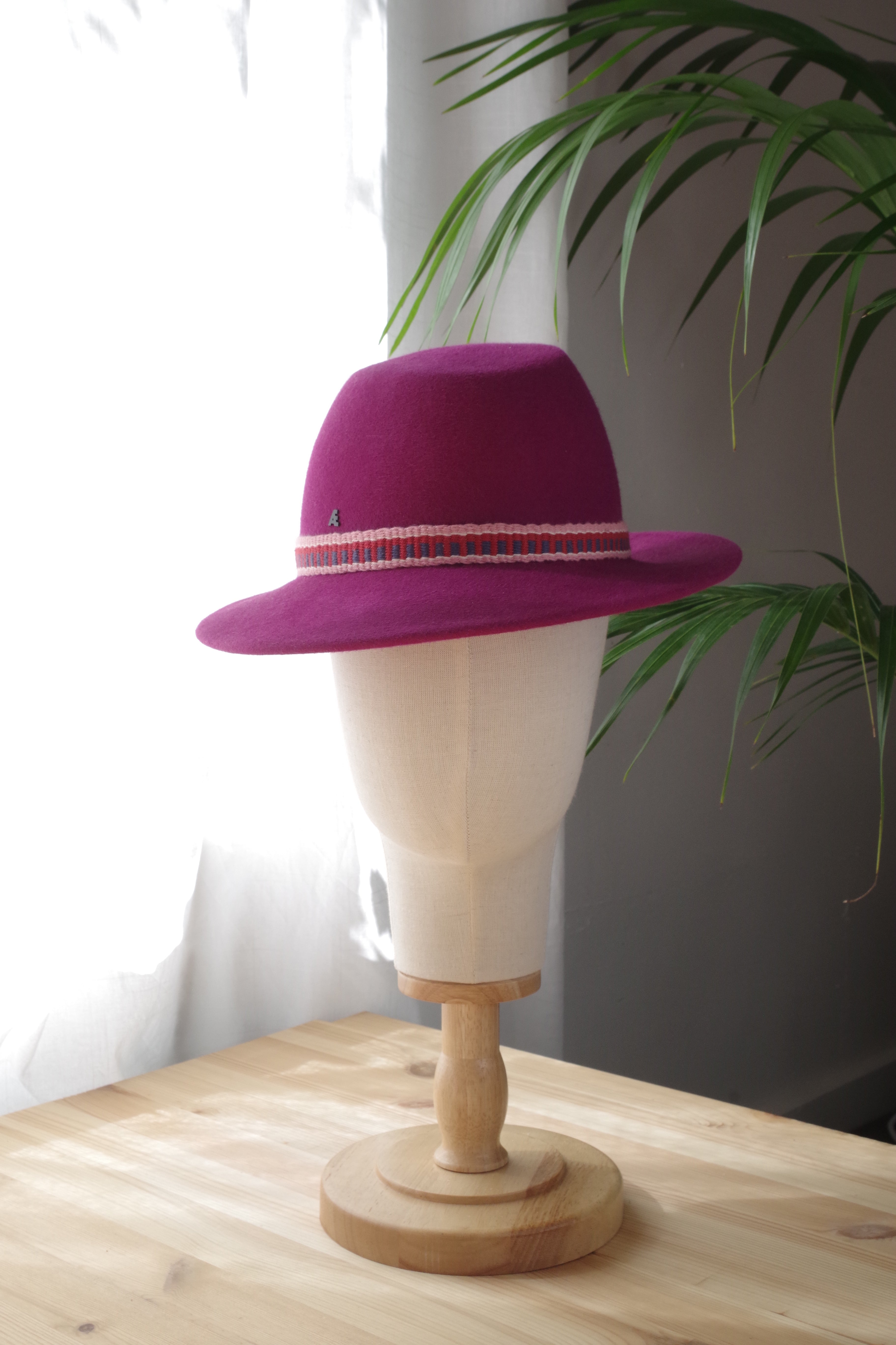 Handcrafted plum fur felt trilby hat with a handwoven ribbon by MICHAETT