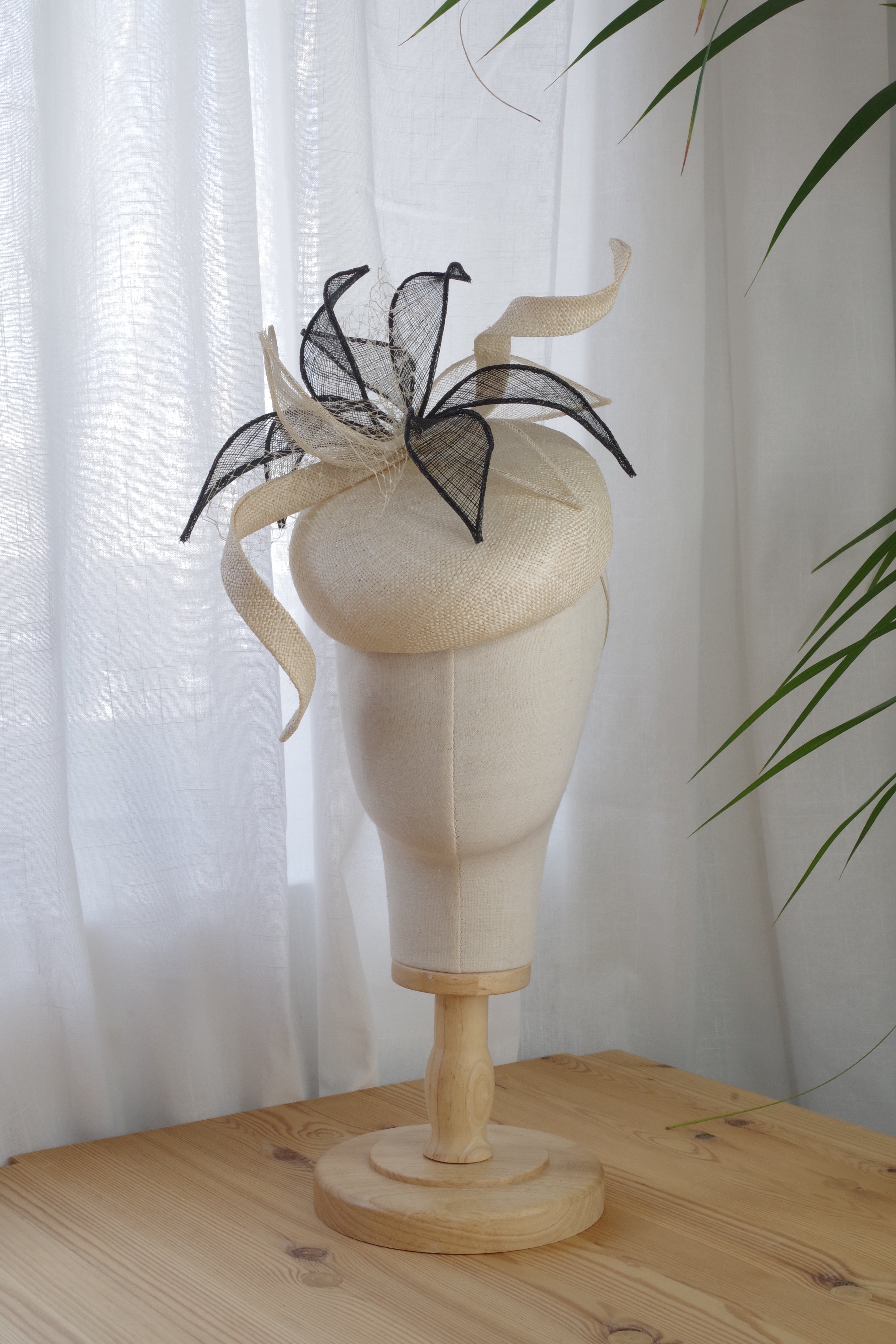 Cream parasaisal straw cocktail hat with black and cream sinamay leaves for Victoria Derby Day by MICHAETT