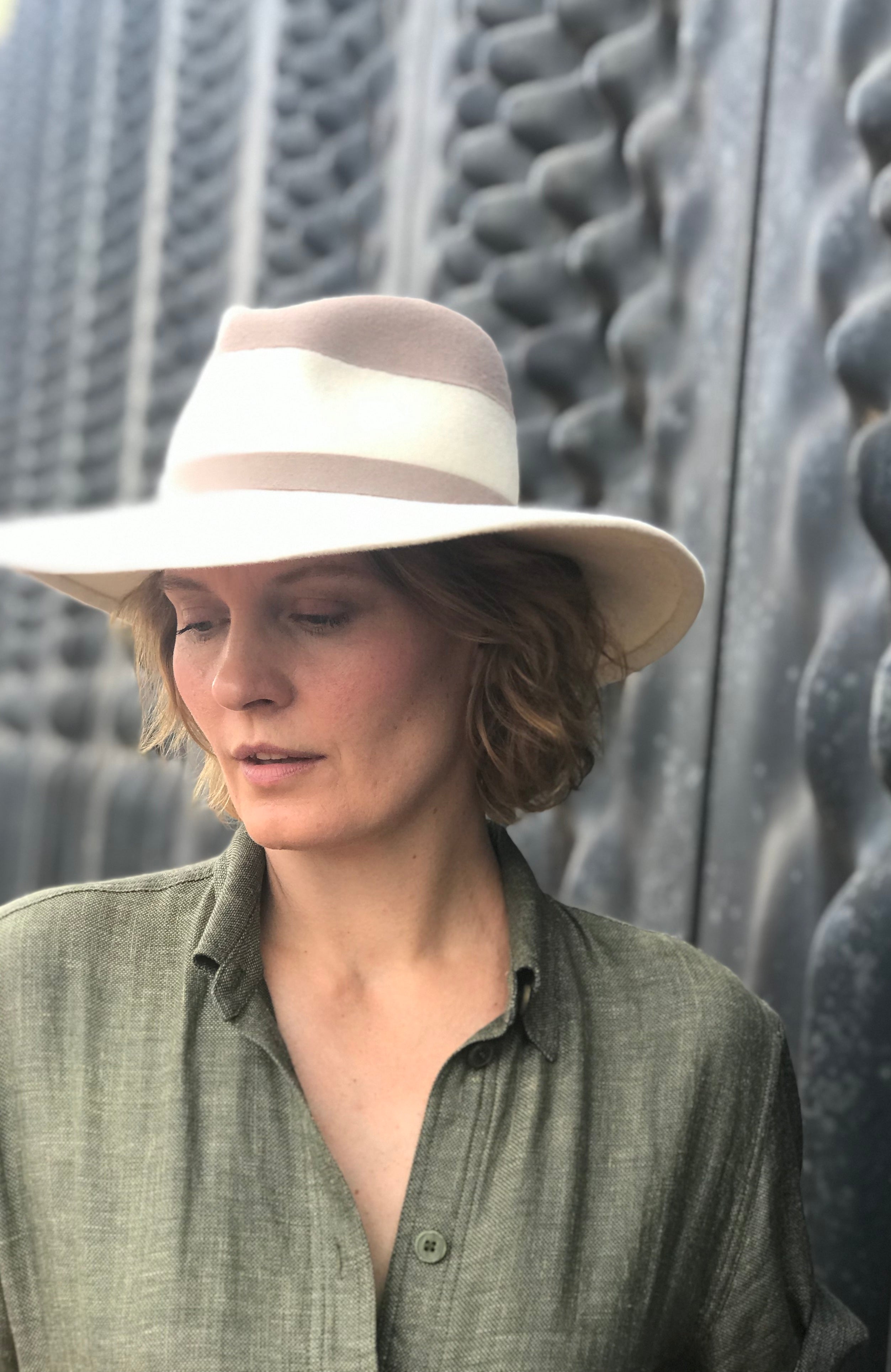 Handcrafted ivory and taupe two-tone fur felt fedora with a handwoven ribbon by MICHAETT