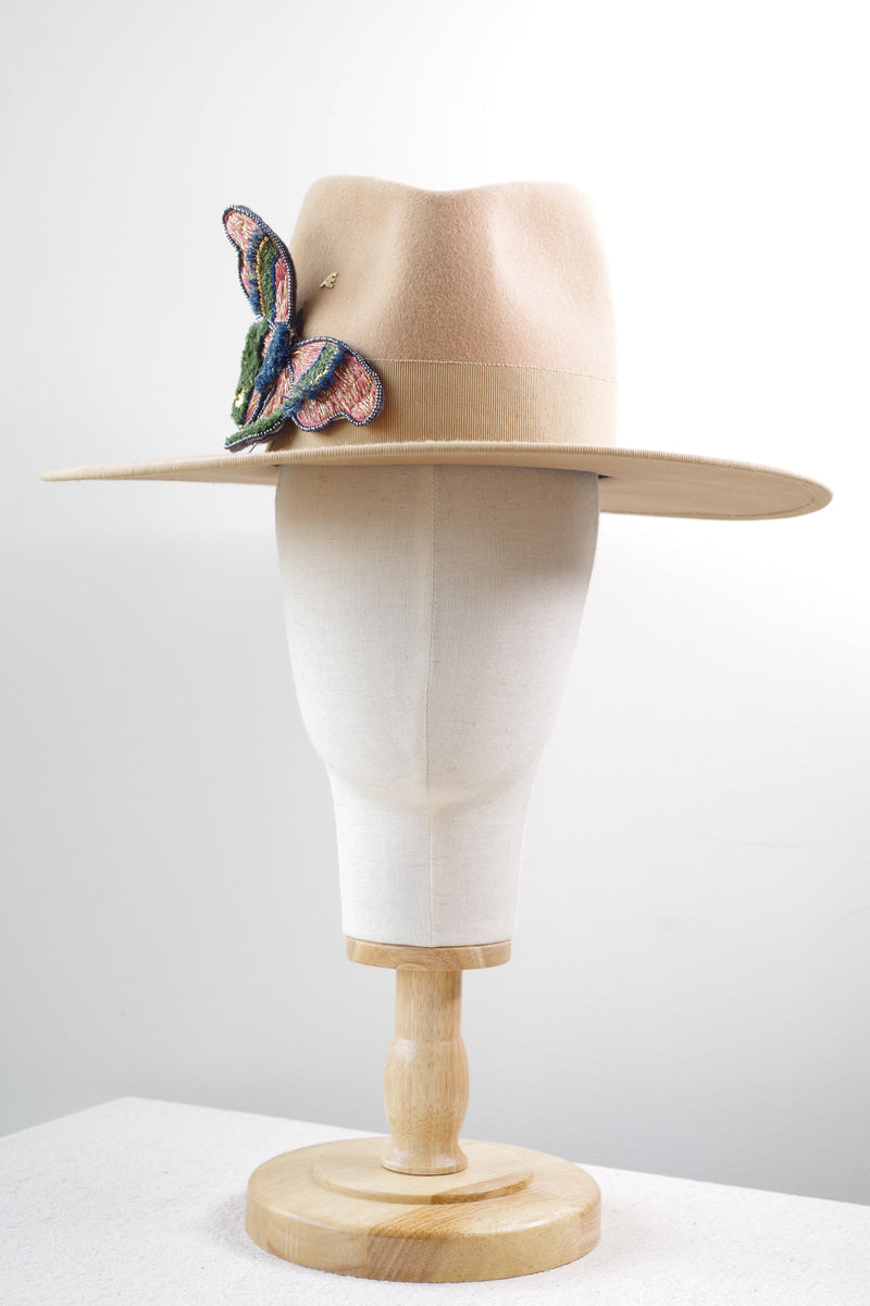 Fedora with a striking brooch