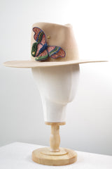 Fedora with a striking brooch